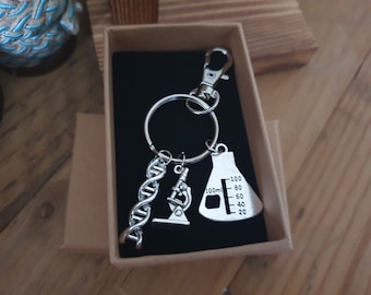 Wetenschapssleutelhanger | DNA, microscoop, erlenmeyers