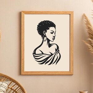May include: Black and white line art print of a woman with short hair and large hoop earrings. The woman is wearing a draped garment and looking to the side.