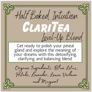 May include: A square product label with a tan background and green decorative corners. The text reads Half Baked Intuition, CLARITea, Level-Up Blend, and lists organic ingredients including Blue Lotus, Hitaki, Lavender, Lemon Verbena, and Mugwort.