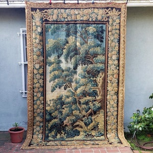 An 18th Century Verdure Tapestry with Birds & Squirrel