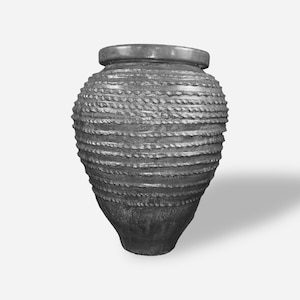 May include: A gray, textured vase with a rounded body and a narrow base. The vase features horizontal, rope-like detailing around its exterior. The top of the vase has a smooth, flat rim. The vase is set against a white background.