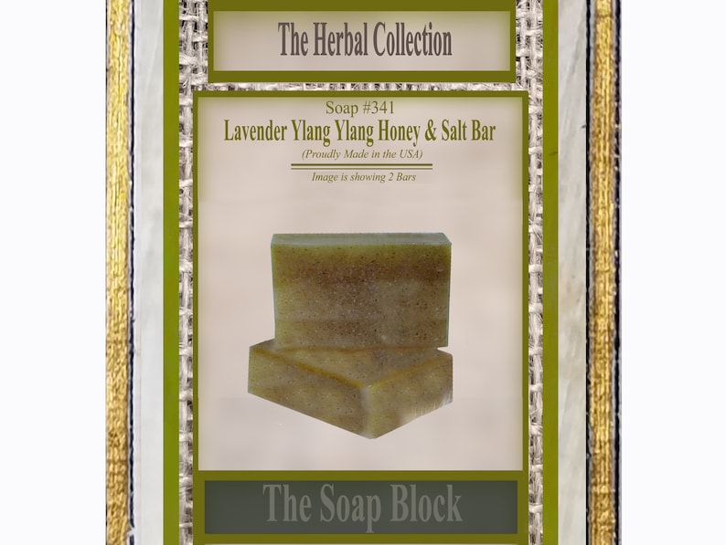 May include: Two bars of green and white soap with a label that reads "The Herbal Collection Soap #341 Lavender Ylang Ylang Honey & Salt Bar (Proudly Made in the USA) Image is showing 2 Bars The Soap Block"