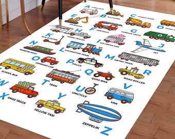 May include: A white alphabet learning mat with colorful illustrations of vehicles and transportation. Each letter of the alphabet is paired with a vehicle, such as an ambulance for A, a bulldozer for B, and a cement mixer for C. The mat is perfect for teaching children about the alphabet and different types of vehicles.