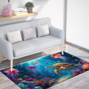 May include: A rectangular area rug featuring an underwater scene with a sea turtle, jellyfish, and colorful coral. The rug has a blue background with vibrant colors and is placed in a living room setting.