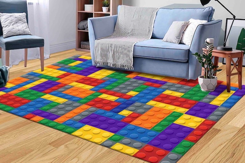 Colorful building block pattern printed rug, perfect for kids' playrooms, bedrooms, and creative spaces, with vibrant primary colors.