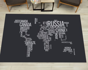 May include: A black and white world map rug with the names of countries written in a word cloud design. The rug is on a light wood floor.