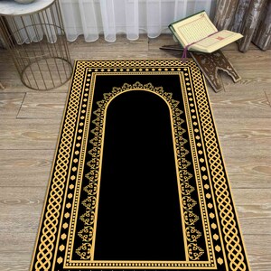 Guldfärgad bönematta, svart bönematta, bönematta, islamisk matta, presentmatta, elegant designmatta, religiös matta, andlig gåva, moskétillbehör,
