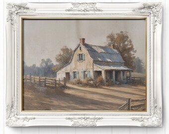 May include: A framed painting of a rustic farmhouse with a weathered tin roof, blue shutters, and a wooden fence. The artwork is set against a neutral background, framed in a white ornate frame, and mounted on a white wooden wall.