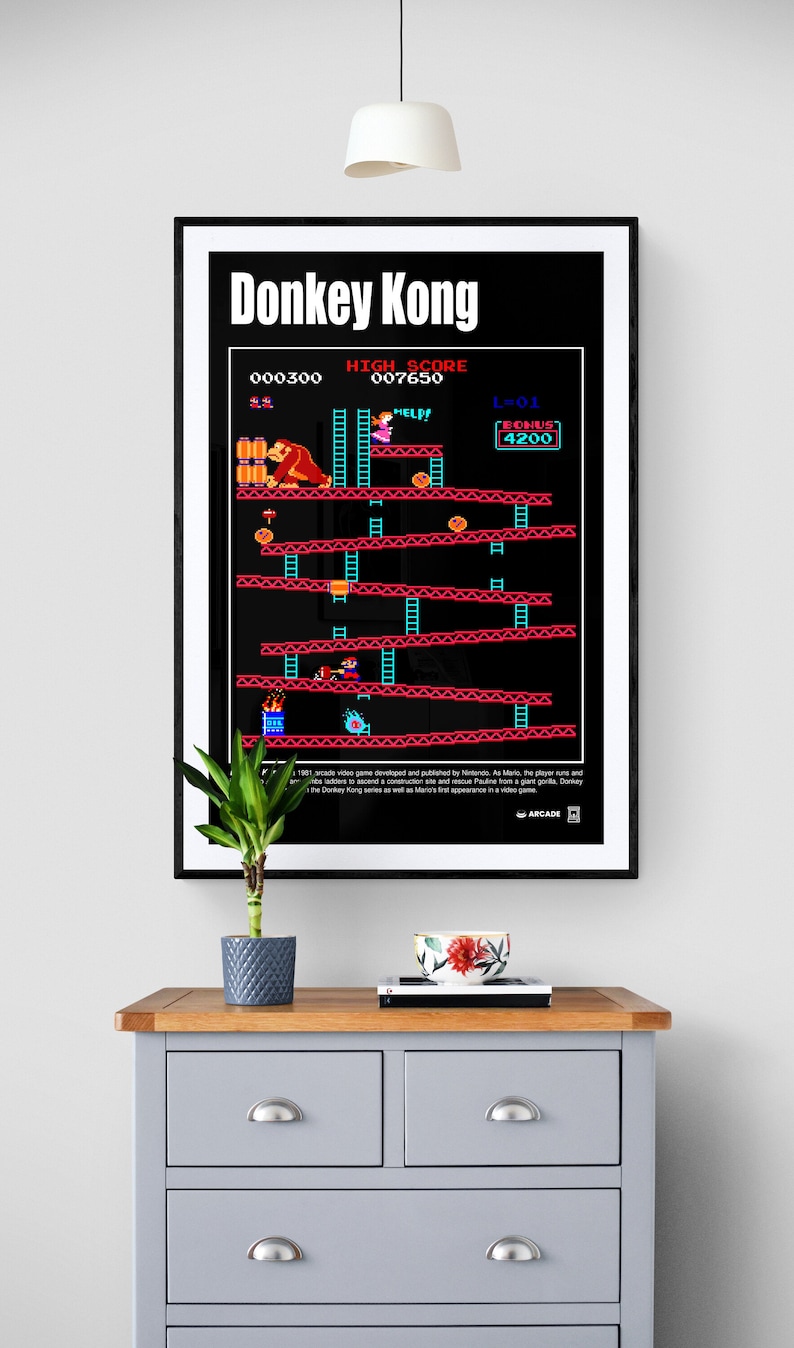 May include: A black and red poster with the title "Donkey Kong" and a screenshot of the classic arcade game. The poster features the characters Mario, Donkey Kong, and Pauline. The score is 000300, the high score is 007650, and the bonus is 4200.