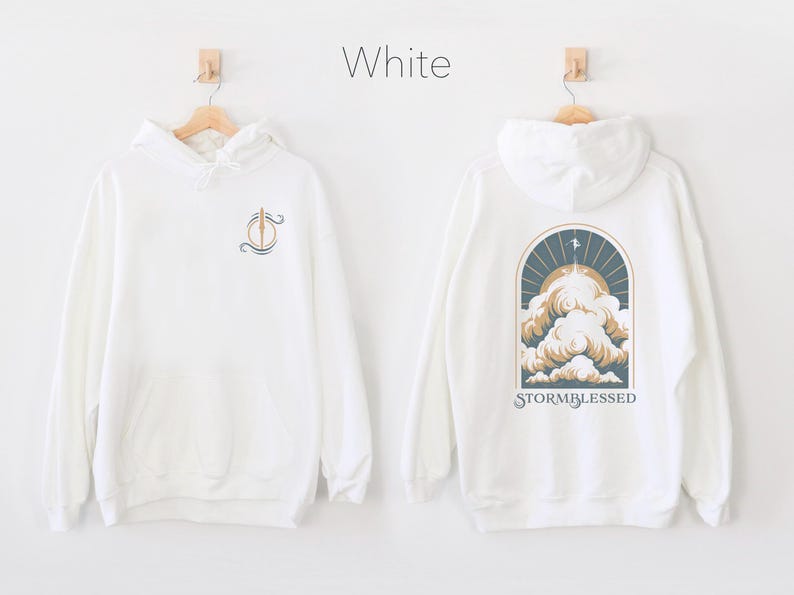 May include: White hooded sweatshirt with a graphic of a cloud with the text "STORMBLESSED" on the back and a small graphic on the front.