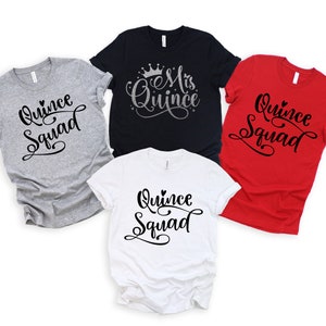 May include: Four t-shirts with the text "Quince Squad" in black script. One shirt is gray, one is red, one is white, and one is black with a silver crown and the text "Mrs. Quince" in silver script.