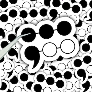 May include: A white sticker with a black semicolon design. The semicolon is made up of a series of connected circles, some black and some white. The sticker is surrounded by other similar stickers, creating a repeating pattern.