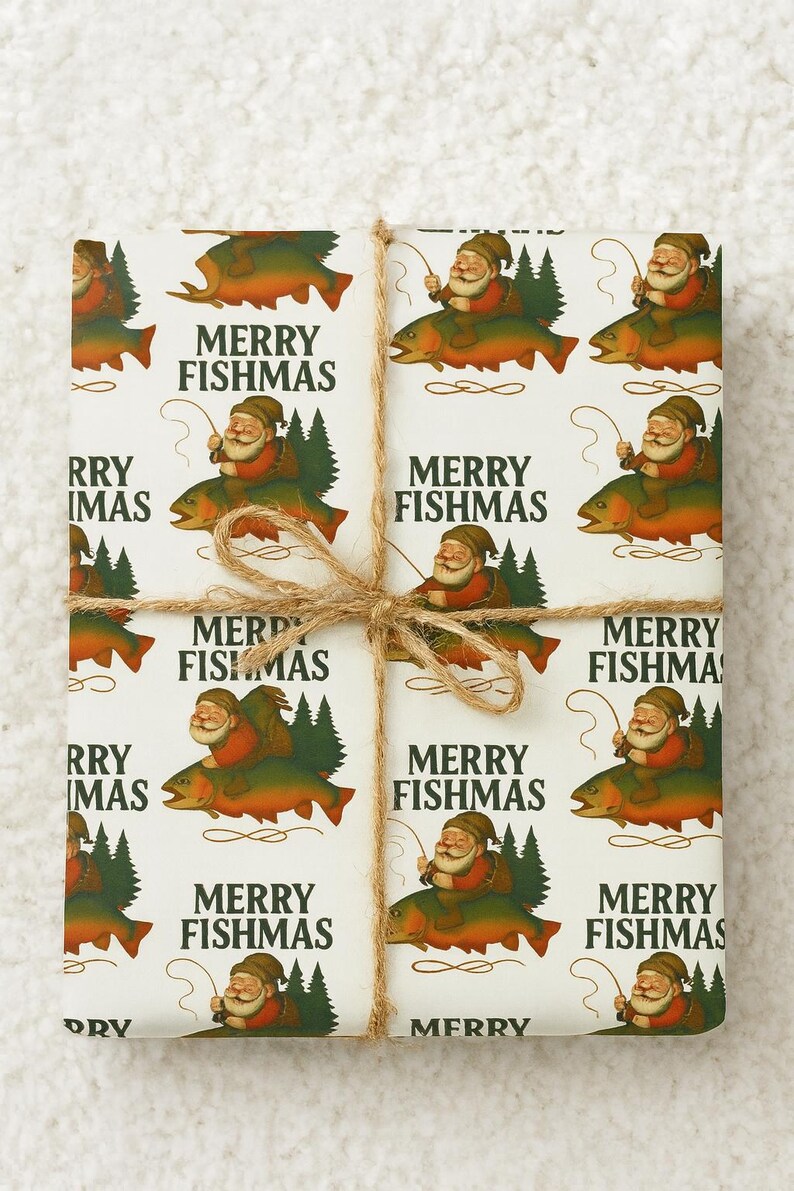 May include: White wrapping paper with a repeating pattern of Santa Claus riding a fish, with the text "MERRY FISHMAS". The paper is tied with twine, creating a festive holiday gift wrap.