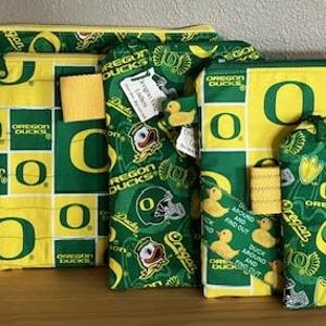 Fußball Enten! Meister! Universität von Oregon Football Reißverschlusstasche komplett gefütterte kleine Tech Geldbörse Kosmetik Geschenktasche