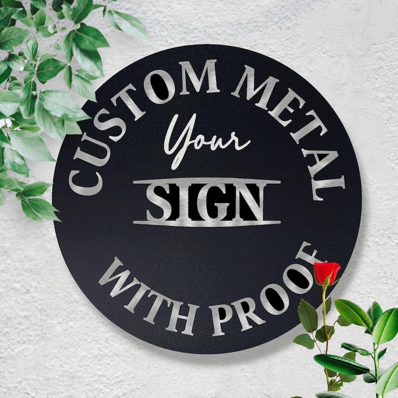 May include: A black circular metal sign with silver lettering that reads "Custom Metal Your Sign With Proof".