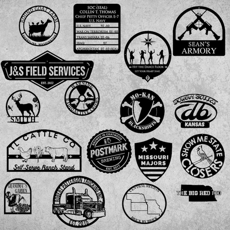 May include: A collection of 14 black metal signs with various designs and text. The signs feature a variety of themes, including animals, military service, music, and food. Some of the signs include text such as "Round Goat Farm", "J&S Field Services", "Sean's Armory", "Mo-Kan Blackshirts", "Dough Bosses", "Show Me State Closers", "Grandma's Garden", "Robert Patterson Trucking Inc.", and "Central Region Brick by Brick".