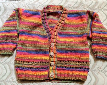 Hand knitted gender neutral 24 inch cardigan, newborn jacket, special gift, baby shower, new baby, matinee coat, rainbow pattern