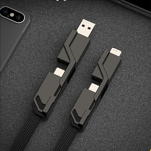 May include: A black 4-in-1 fast charging cable with multiple connectors, including USB-A, USB-C, and Lightning. The text "4-in-1 fast charging cable" and "Charging without interface" is visible on the image.