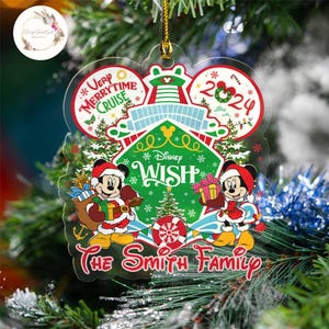 May include: A clear plastic Christmas ornament featuring Mickey Mouse and Minnie Mouse in front of a Disney Wish cruise ship. The ornament has the text "Very Merrytime Cruise" and "Disney Wish" on it. The ornament also has the year "2024" and the text "The Smith Family".