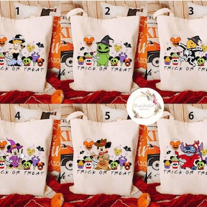 May include: Six white canvas tote bags with different Halloween character designs. Each bag has the text "Trick or Treat" printed on the front. The characters include Mickey Mouse, Minnie Mouse, Stitch, Jack Skellington, and a witch.