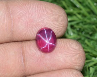 6 Ray Star Red Ruby Gemstone: 10x09x05mm Oval, Mozambique