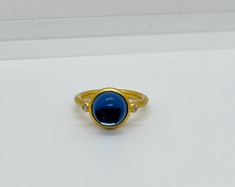 Beautiful sterling silver 925 and 22ct yellow gold plated Julie Sandlau ring with Blue stone