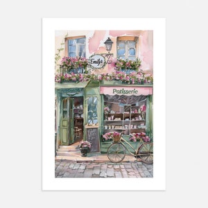 May include: A watercolour painting of a French bakery called "Emily's Patisserie". The shop front is painted in shades of green and pink with a bicycle parked outside. The bakery has a sign that says "Patisserie" and a window display filled with pastries.
