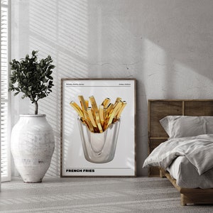 May include: A minimalist poster with a white background featuring a silver bowl filled with golden french fries. The poster has the text "French Fries" at the bottom and "Metallic Reality Series" and "Gallery Edition" at the top.
