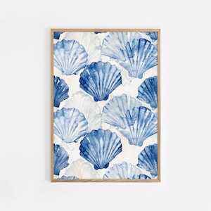 May include: A framed print featuring a watercolor pattern of blue seashells on a white background.
