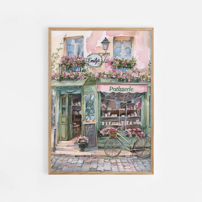 May include: A watercolour painting of a Parisian bakery storefront with a pink awning that says "Patisserie". The bakery is called "Emily's" and has a bicycle parked in front of it.
