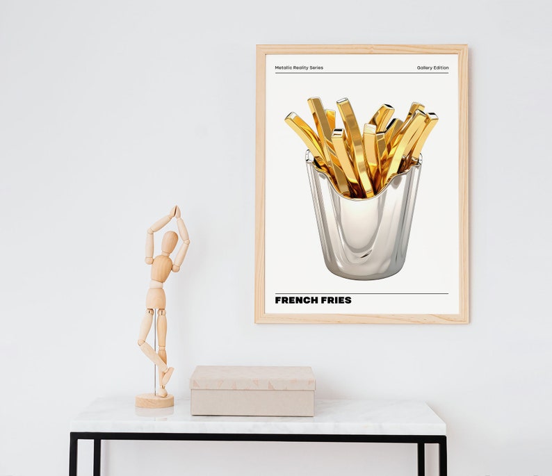 May include: A framed print with a gold metallic design of french fries in a silver container. The print has the text "Metallic Reality Series" and "Gallery Edition" at the top and "FRENCH FRIES" at the bottom.
