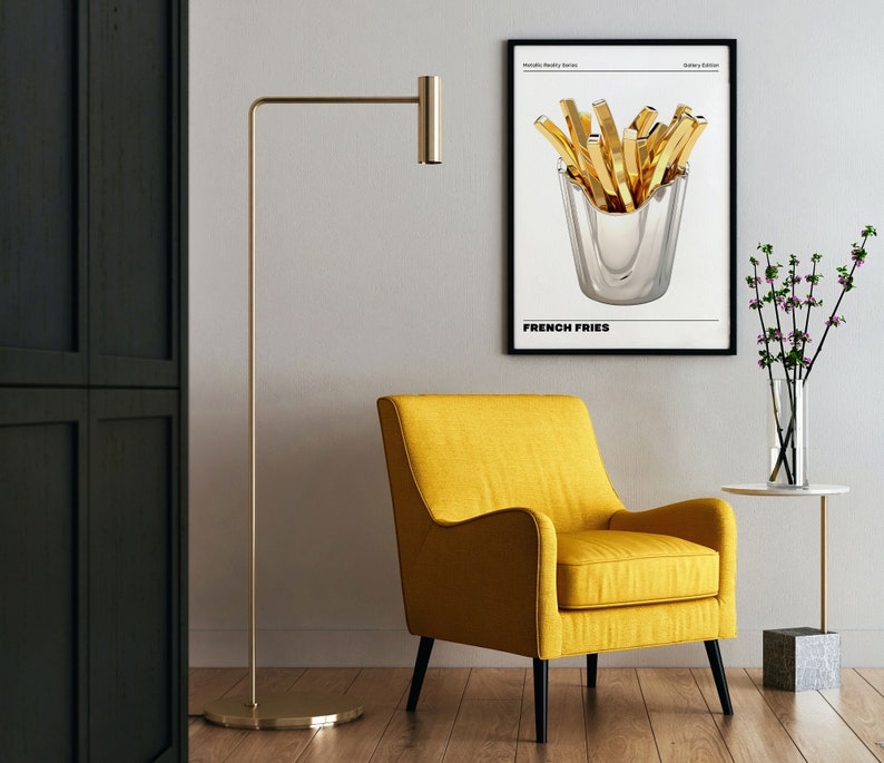 May include: A black and white poster with a gold french fry illustration in a silver container. The poster has the text "French Fries" at the bottom.