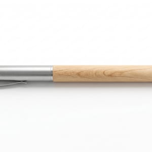May include: A pen with a light wood barrel and a silver metal cap and tip. The pen has a silver clip and a smooth, natural wood grain finish. The pen is designed for writing.