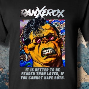 May include: A black short-sleeved t-shirt featuring a graphic print of the character RanXerox. The design includes the text "RANXEROX" at the top and the quote "IT IS BETTER TO BE FEARED THAN LOVED, IF YOU CANNOT HAVE BOTH." printed in white below the image.