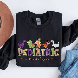 PICU Nurse Halloween Sweatshirt for Pediatric Intensive Care Unit Nurse, PEDS Dinosaur Shirt Pediatric Nurse Dinosaurs, PICU Halloween Squad