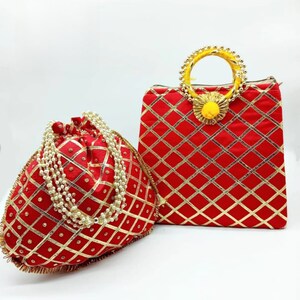 May include: Two red fabric handbags with gold diamond patterns. One is a drawstring pouch with a pearl strand, and the other is a square bag with a yellow handle and a gold flower accent.