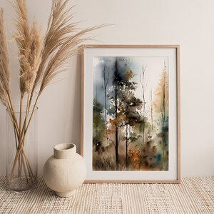 May include: A framed watercolor painting of a forest scene with tall trees in shades of brown, green, and blue. The trees are set against a hazy background, creating a sense of depth and mystery.