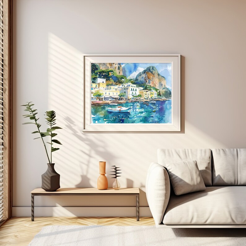 May include: A watercolour painting of a coastal town with colourful buildings, a small boat in the water, and a mountain in the background.