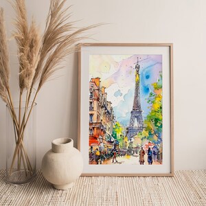 Puede incluir: Una pintura de acuarela de la Torre Eiffel en Par&iacute;s, Francia. La pintura representa una escena de calle con edificios y personas caminando. La pintura est&aacute; enmarcada en un marco de madera claro.