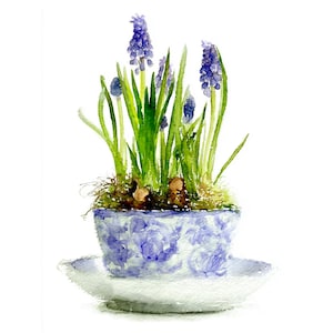 Puede incluir: Un juego de tres tazas de cerámica con un acabado mate moteado. Las tazas son de color crema, gris claro y gris oscuro. Cada taza tiene un diseño simple y moderno y un asa redondeada.