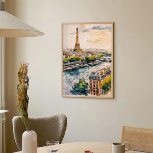 Puede incluir: Una pintura de acuarela enmarcada de la Torre Eiffel en Par&iacute;s, Francia. La pintura representa la torre desde la distancia, con el r&iacute;o Sena y los edificios circundantes en primer plano. El cielo es de un suave rosa y naranja pastel.
