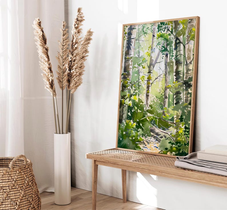 May include: A framed watercolor painting of a forest scene with green trees and a path leading through the woods.