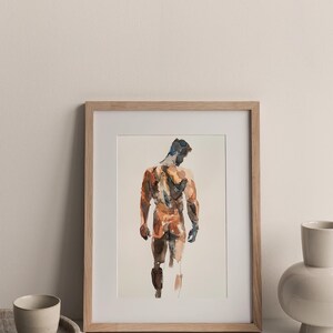 K&ouml;nnte beinhalten: Ein gerahmtes Aquarellbild einer nackten Figur, die mit dem R&uuml;cken zum Betrachter steht. Die Figur ist in Braun- und Oranget&ouml;nen gemalt, mit einem Hauch von Blau im Haar.