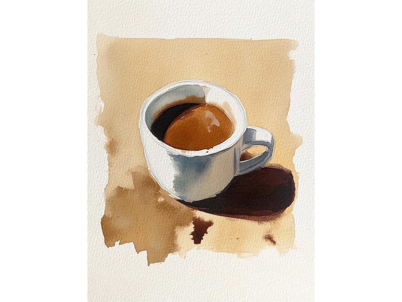 Puede incluir: Una taza de caf&eacute; de cer&aacute;mica blanca con caf&eacute; marr&oacute;n en su interior. La taza est&aacute; sobre una superficie marr&oacute;n con una mancha marr&oacute;n.