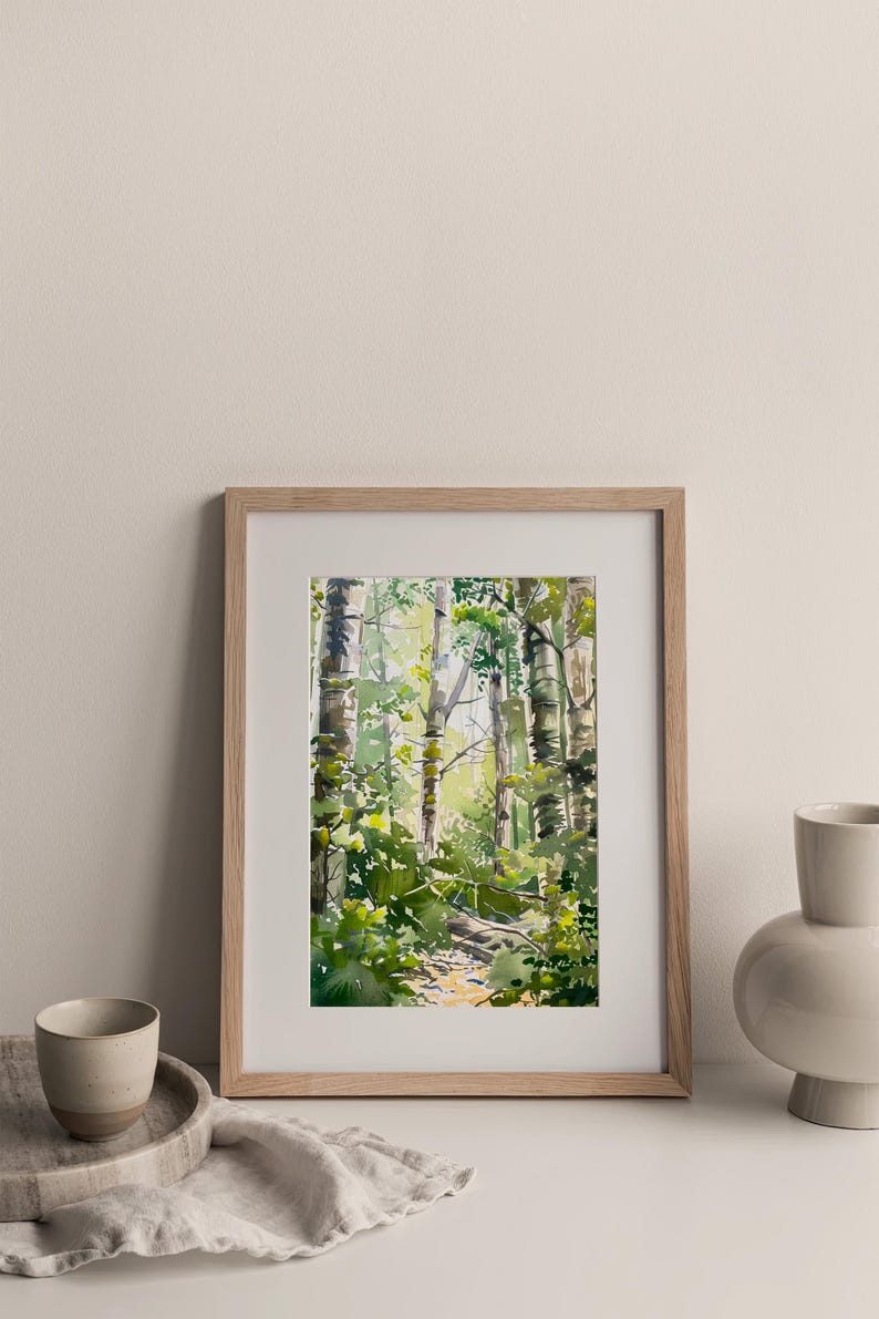 May include: A framed watercolor painting of a forest path with tall trees and green foliage. The path is visible in the center of the image, leading into the woods.