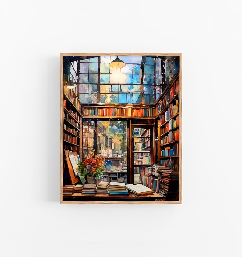 May include: A watercolour painting of a bookstore interior with bookshelves filled with books, a window with a view of a street, and a table with stacks of books. The painting is framed in a wooden frame.