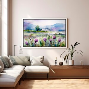 May include: A watercolor painting of a white cottage in a field with purple wildflowers. The cottage is set against a backdrop of rolling hills and a blue sky.