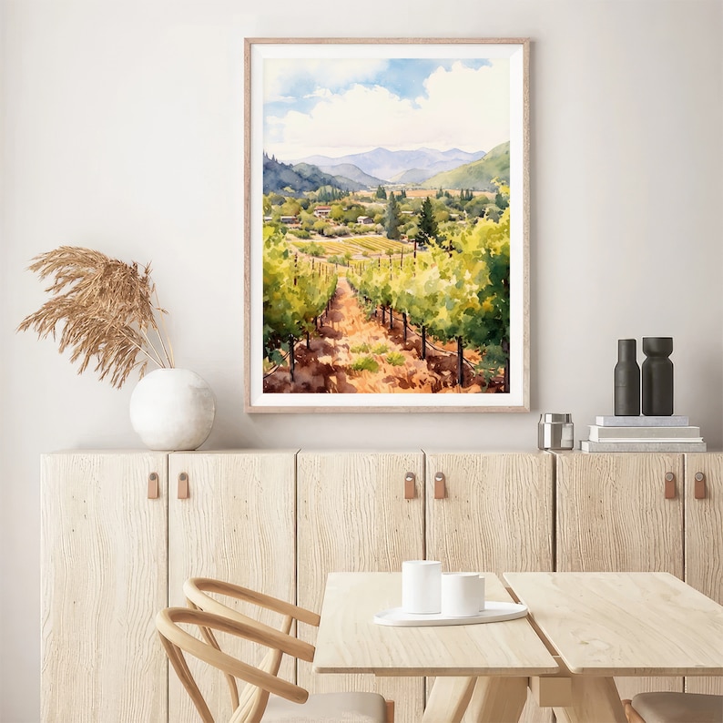 May include: Watercolor painting of a vineyard landscape with rows of grapevines leading to a distant view of rolling hills and a small town.