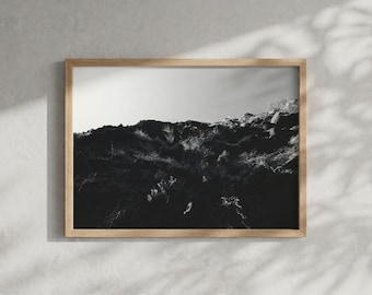 Roots | backlit rocky cliff seen from below | Black and White Fine Art Photography