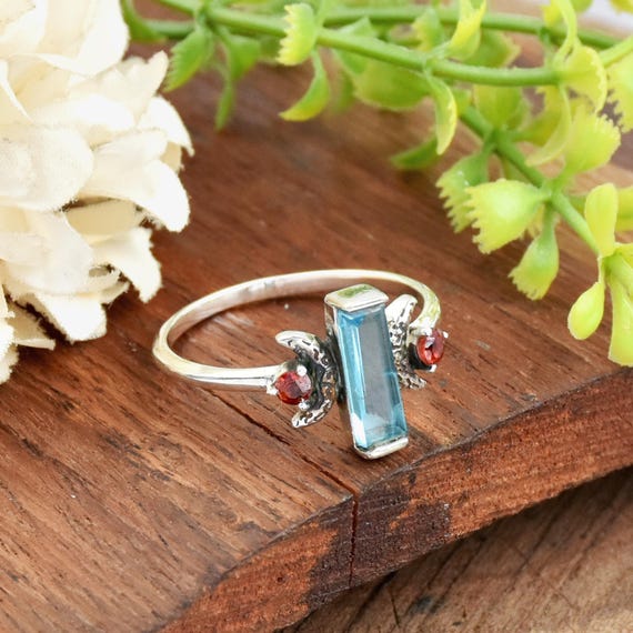 Blue Topaz Baguette Ring: Sterling Silver Celestial Crescent Moon